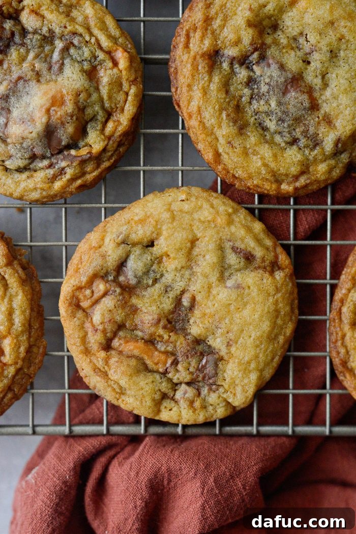 Butterfinger cookies cooling on a wire rack.