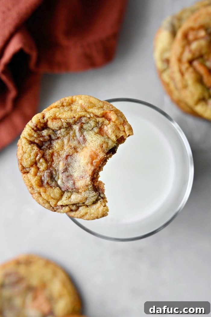 A perfectly baked Butterfinger cookie, highlighting its golden exterior and tempting texture.