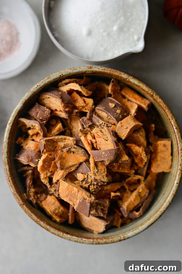 Coarsely chopped Butterfinger candy bars ready to be added to the cookie dough.