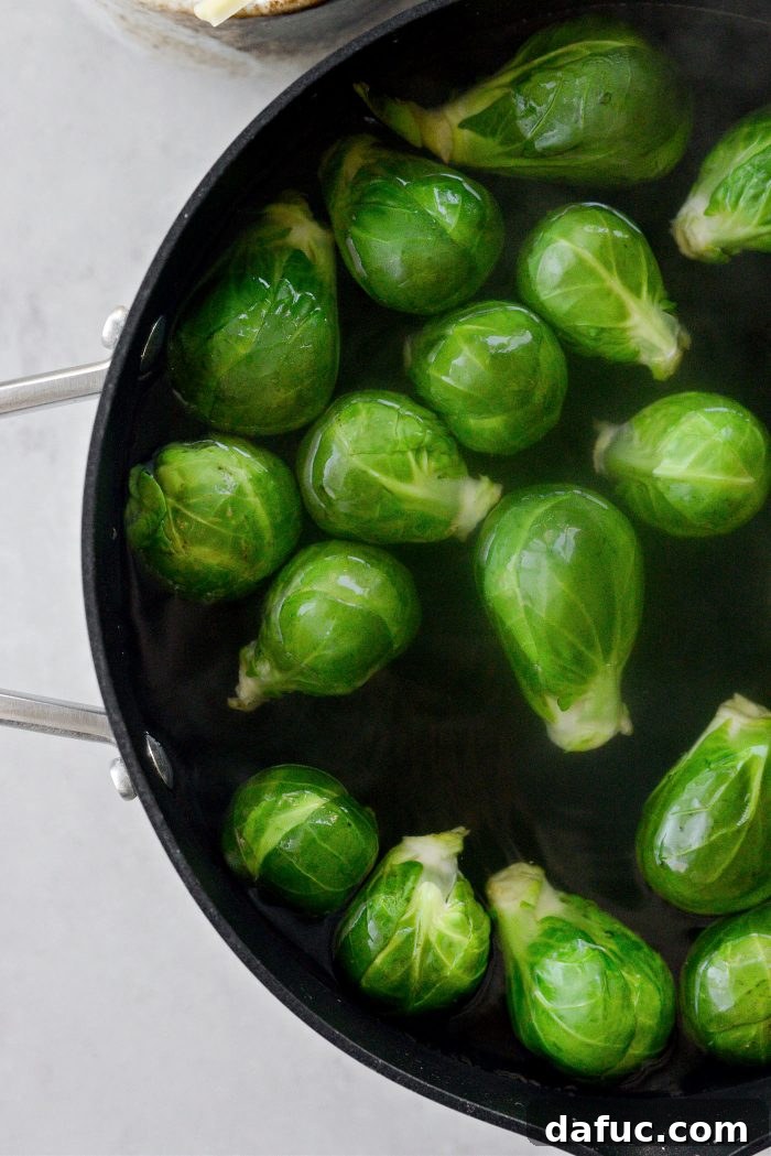 Creamy Cheesy Brussels Bake 6 Brussels sprouts added to boiling water for par-cooking