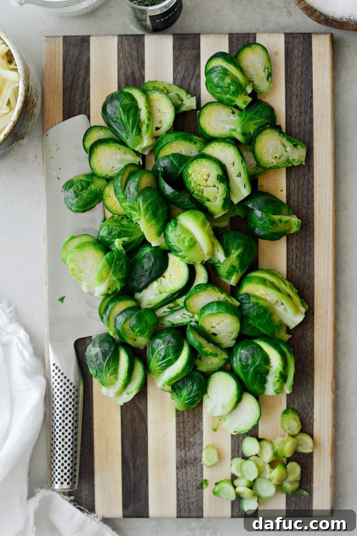Creamy Cheesy Brussels Bake 9 Trimmed and sliced Brussels sprouts on a cutting board