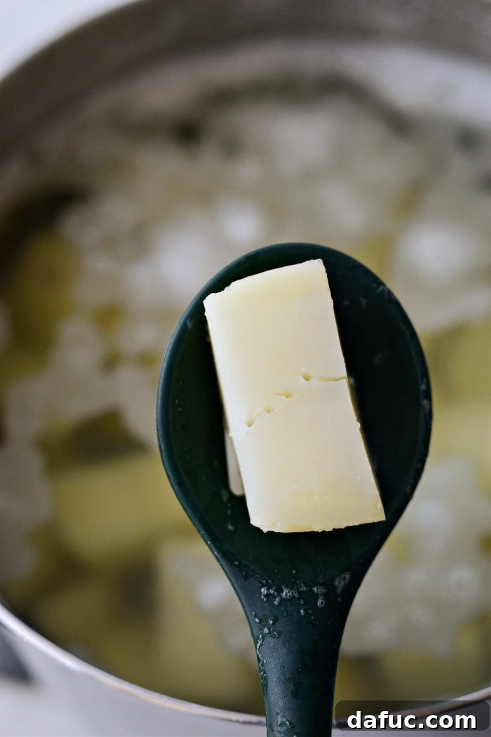 Heirloom Mashed Potatoes 10 cook 15 to 20 minutes or until fork tender - fork testing tenderness of cooked potatoes