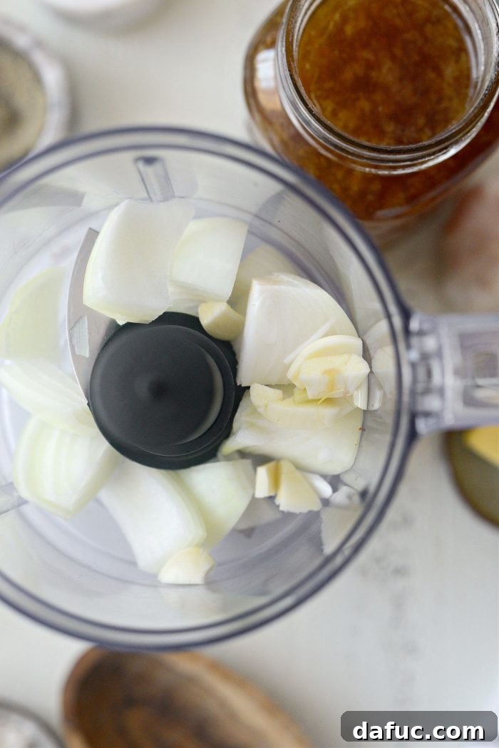 Hearty Turkey Skillet 7 Adding onion and garlic to a mini food processor