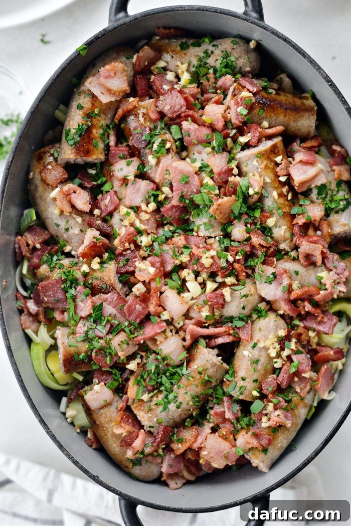 Dublin's Hearty Comfort Coddle 16 The crispy bacon, cooked garlic, and remaining parsley being added as the final top layer.