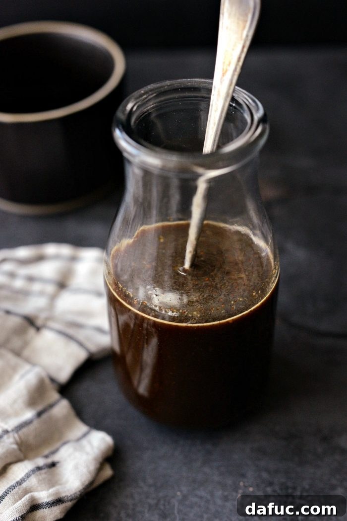 Two bottles of Worcestershire sauce - homemade and store-bought for comparison.