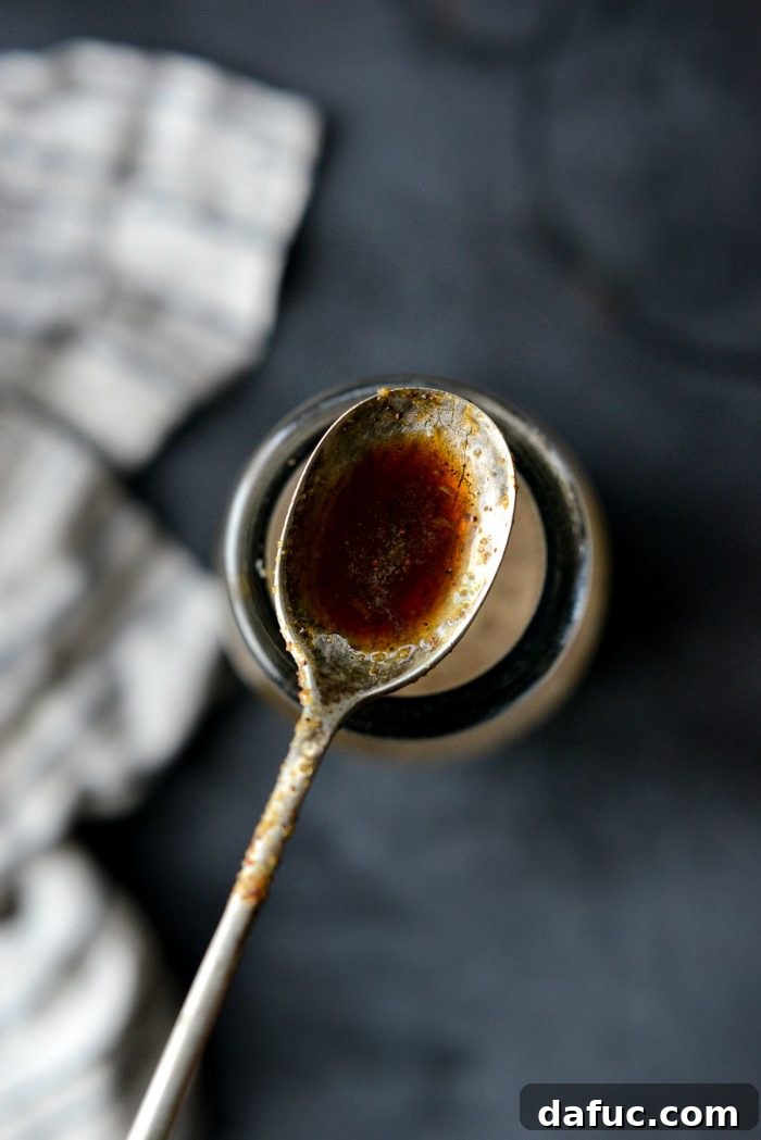 A bottle of homemade Worcestershire sauce ready to use.