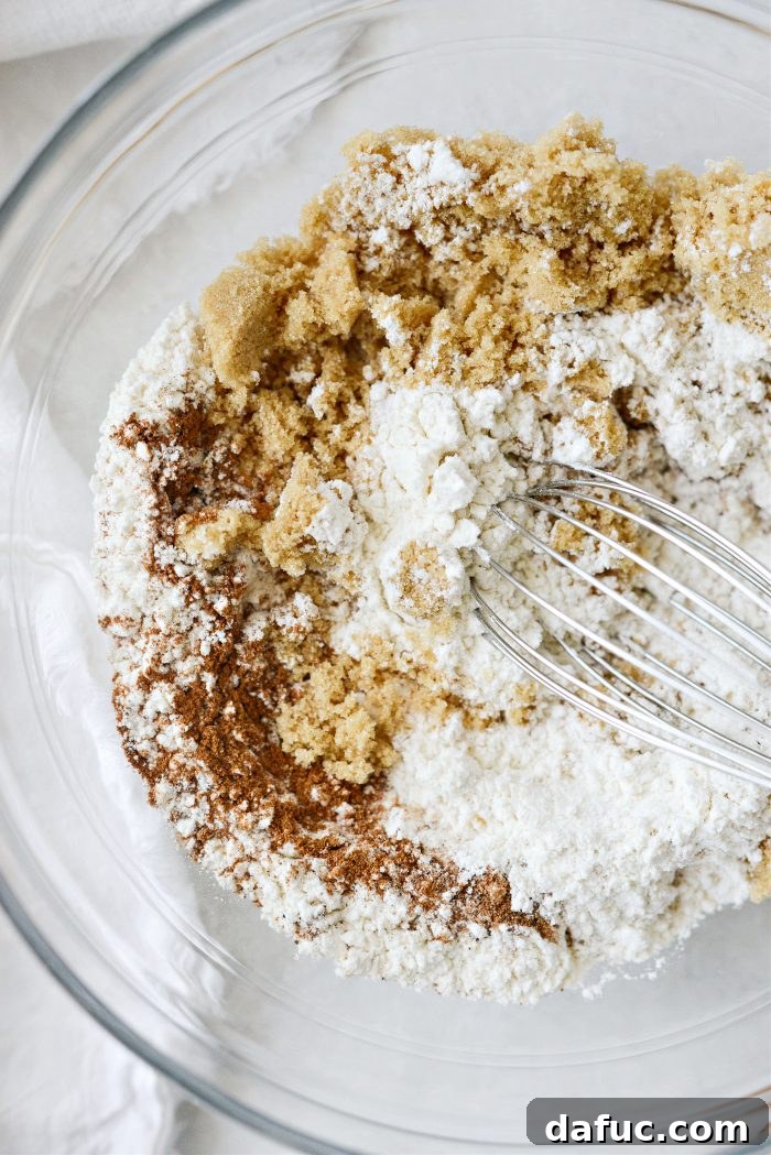 Mixing streusel ingredients in a bowl