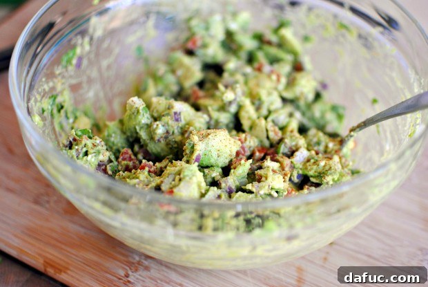 Smoky Blue Guac Perfection 21 Adding bacon and crumbled Gorgonzola cheese to guacamole