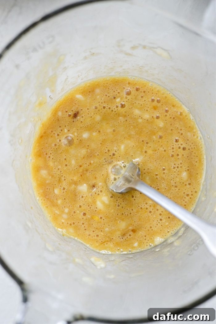 Wet ingredients stirred to combine