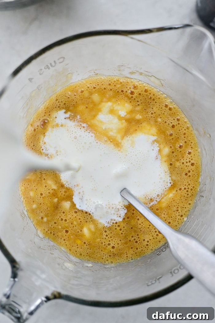 Adding milk to the wet ingredients