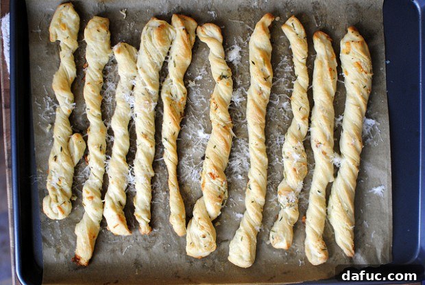 Savory Garlic Herb Breadsticks 2 Delicious Garlic Herb Breadsticks ready to serve, perfect for dipping in pasta sauce.