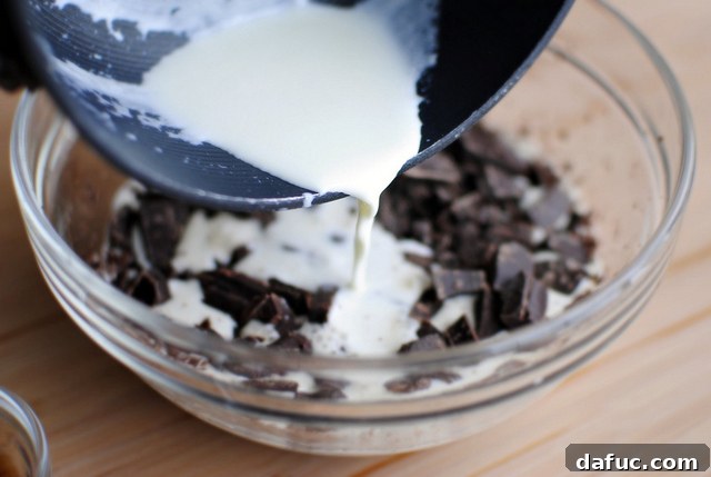 Mystic Mayan Truffles 7 Pouring hot cream over finely chopped dark chocolate