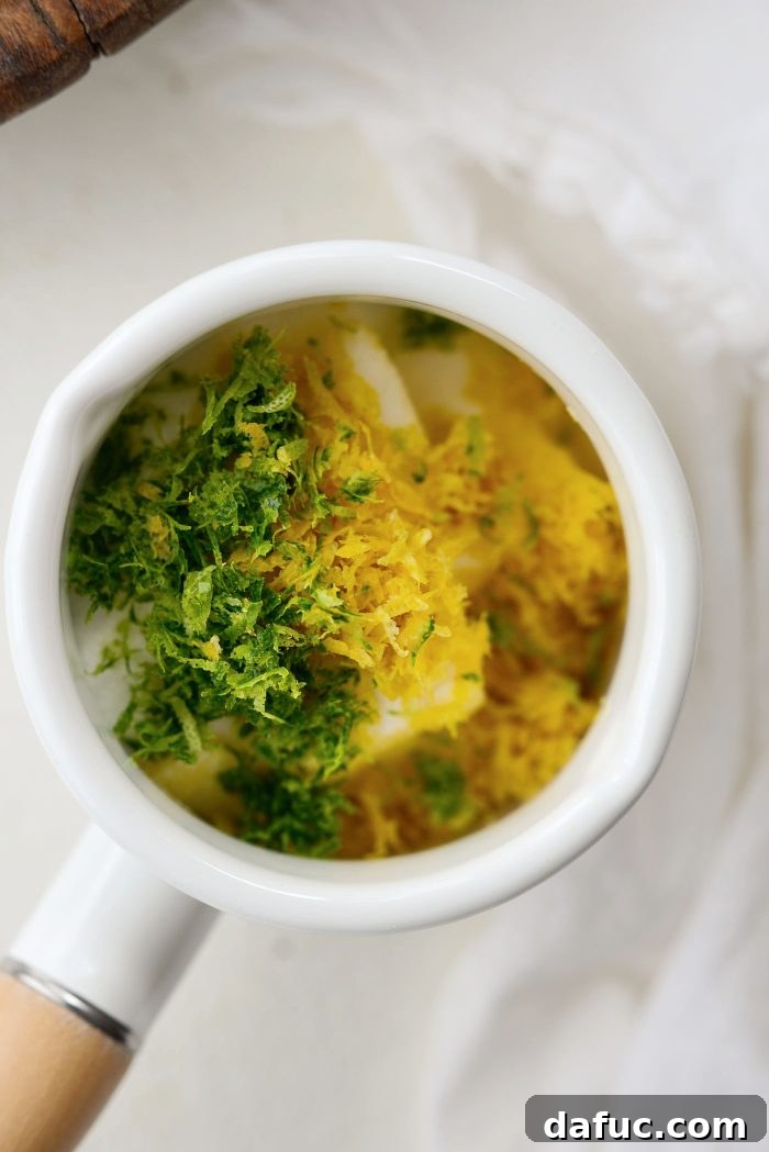 Ingredients for the citrus glaze, including butter, sugar, and fresh lemon and lime zest and juice, in a small saucepan.