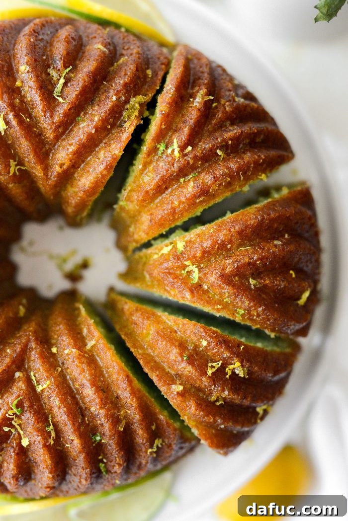 A stunning full view of the glazed Lemon Lime Bundt Cake, ready to be sliced and served.