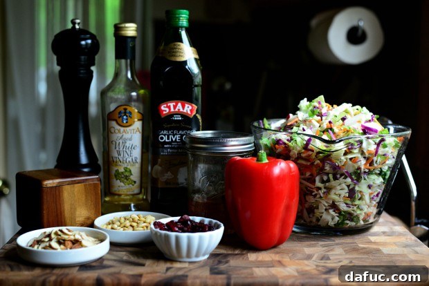 Bowl of Rainbow Crunch Salad with a spoon.