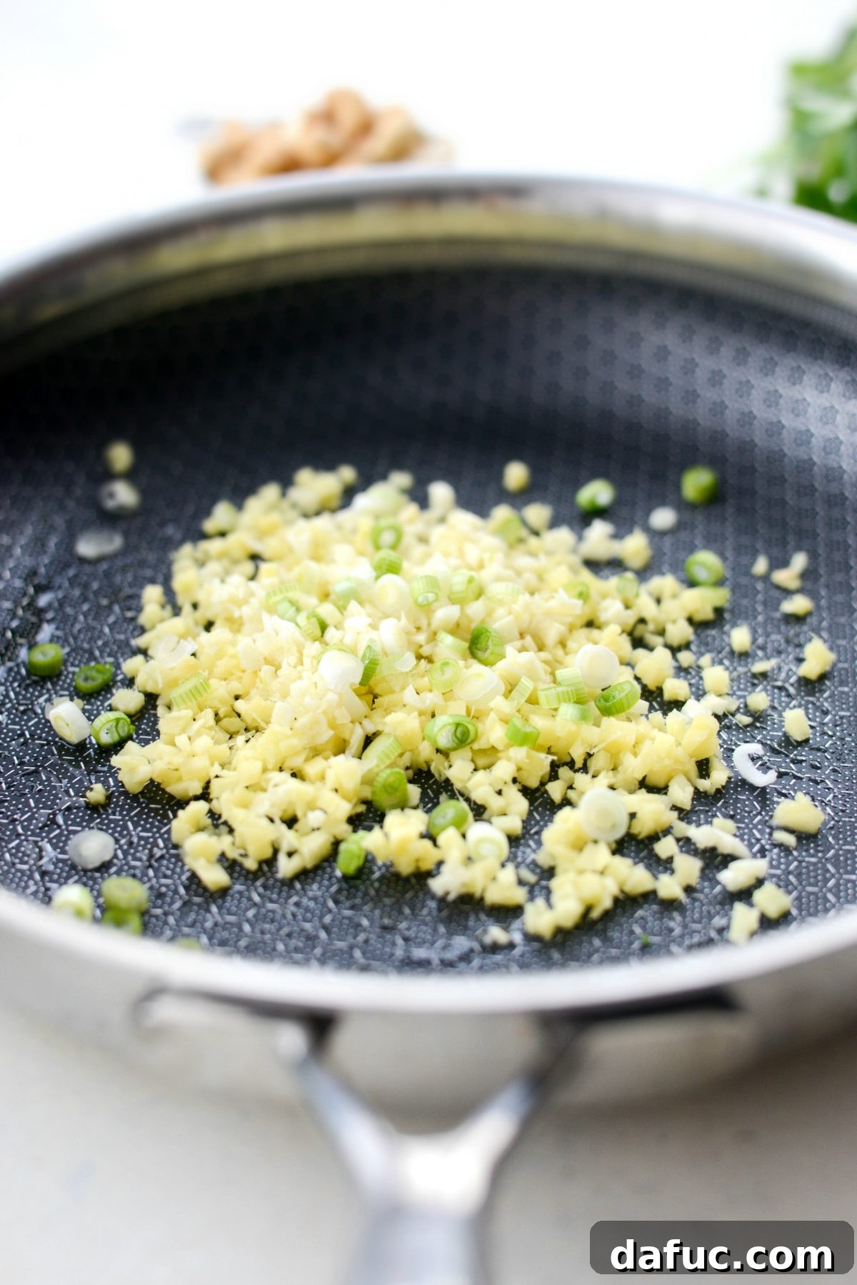 Vibrant Ginger Cashew Lettuce Wraps 6 Sautéing ginger, garlic, and green onion in a nonstick skillet