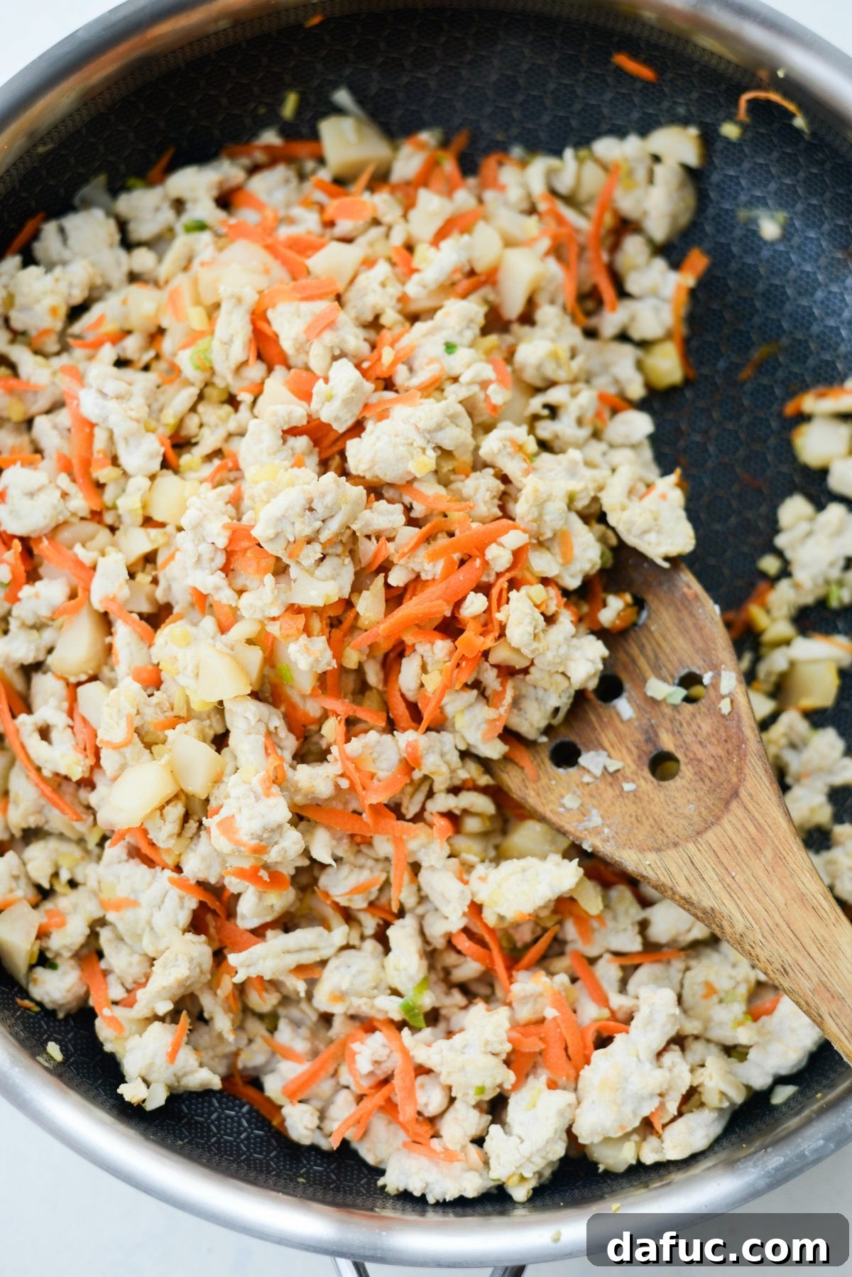 Vibrant Ginger Cashew Lettuce Wraps 8 Sautéing the turkey and vegetables for the lettuce wraps