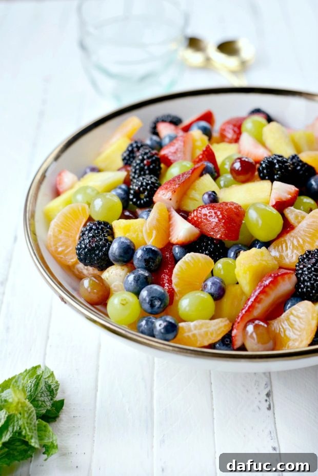 Prismatic Fruit Delight 25 Beautifully presented rainbow fruit salad ready to serve