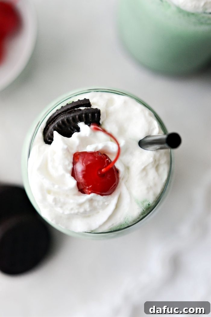 Two glasses of Cookies and Cream Shamrock Shake ready to be served