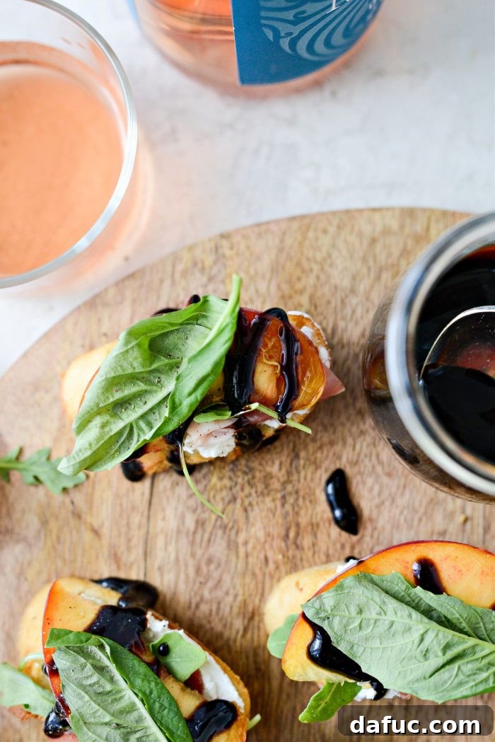 Peach Prosciutto Chèvre Crostini 13 Final assembly of Peach Prosciutto Goat Cheese Crostini with balsamic glaze and basil garnish