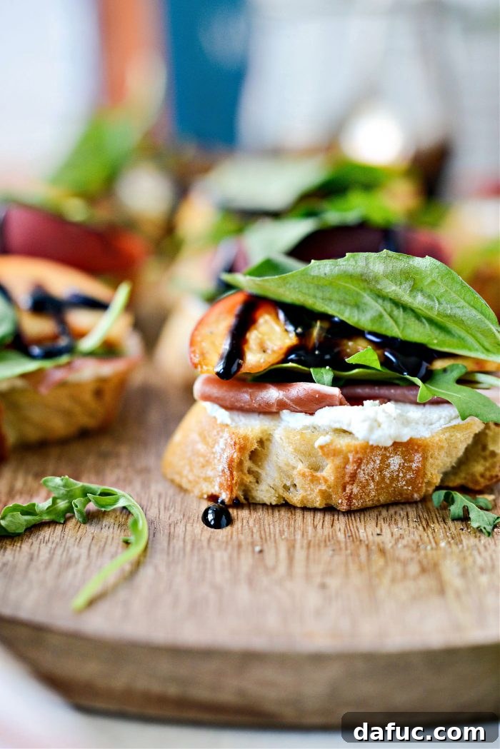 Peach Prosciutto Chèvre Crostini 15 A different angle of the stunning Peach Prosciutto Goat Cheese Crostini on a serving board