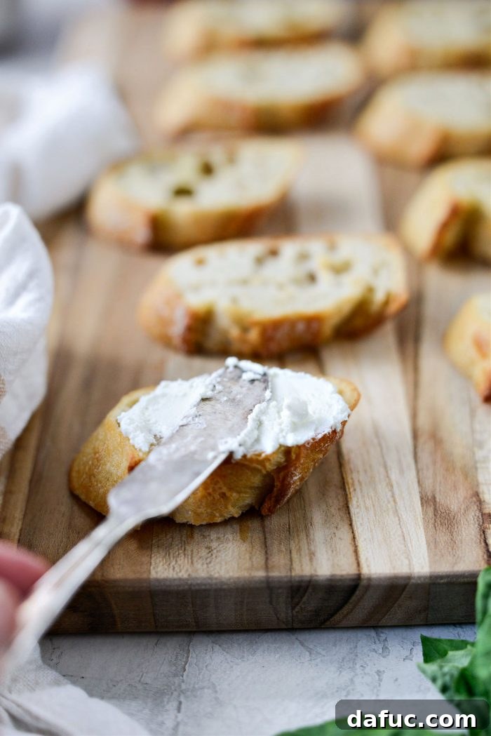Peach Prosciutto Chèvre Crostini 9 Applying whipped goat cheese to toasted baguette slices