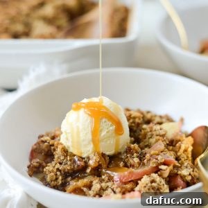 Effortless Apple Crumble 18 Thumbnail image of the Easiest Apple Crisp, served warm with ice cream and caramel.