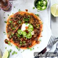 Fiestadas - a homemade copycat Mexican pizza with taco beef and cheese on a thin crust