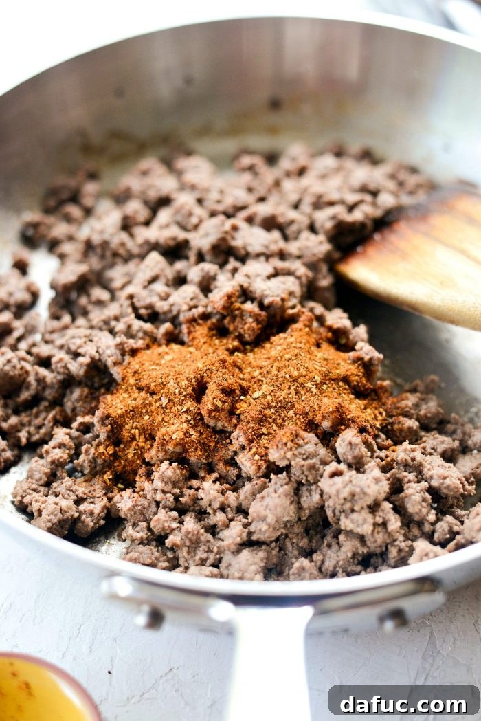 Browning ground beef in a skillet for the Fiestada filling
