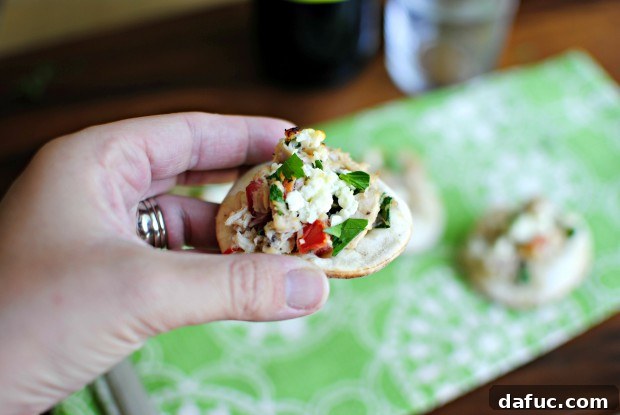yum Golden brown Mini Tuna Melts, hot out of the oven, with melted feta.