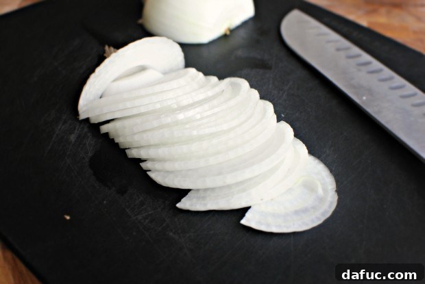 Thinly slicing onions