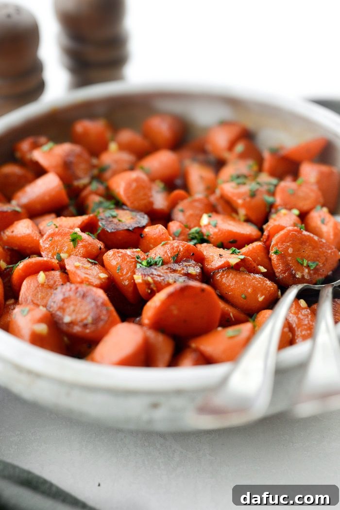 Close-up of perfectly cooked Maple Glazed Carrots with a glistening glaze, ready to be served