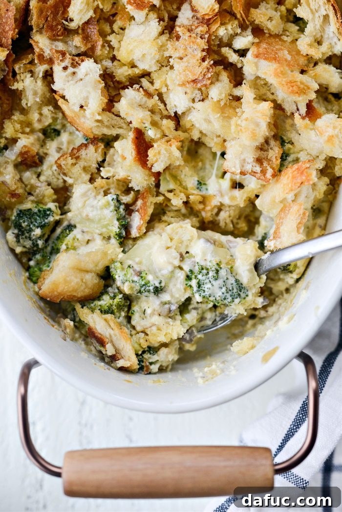 Cozy Broccoli Bake 3 Close-up of Homemade Broccoli Casserole showing rich, creamy texture and cheese strings