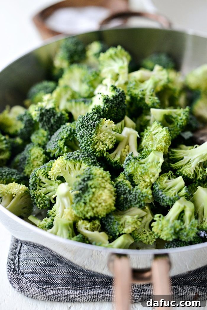 Cozy Broccoli Bake 10 Adding broccoli florets to the skillet