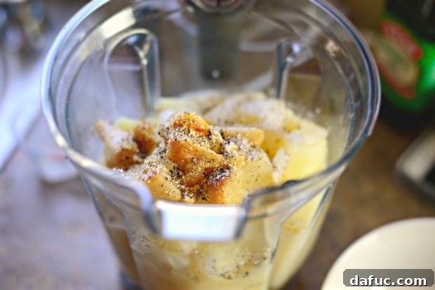 Cooked potatoes and onions added to the blender