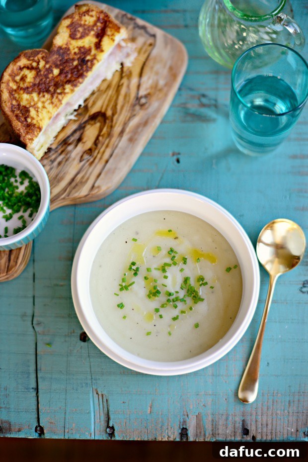 Finished roasted garlic potato soup in a bowl