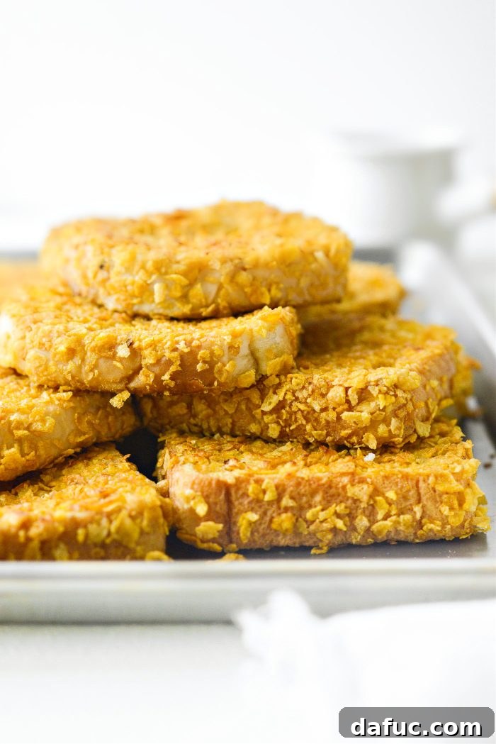 Crunchy Cornflake French Toast 14 Flipping and continuing to cook Cornflake Crusted French Toast on the griddle