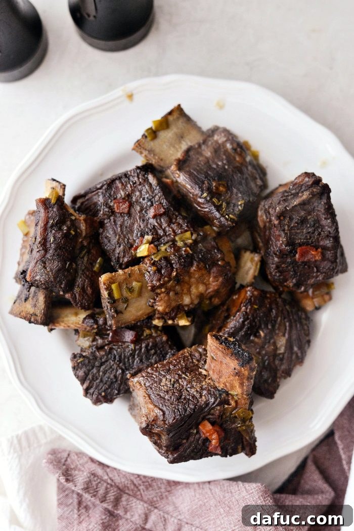 Slow-Braised Beef Short Ribs 18 Platter of incredibly tender braised short ribs, ready to be reunited with their rich gravy.