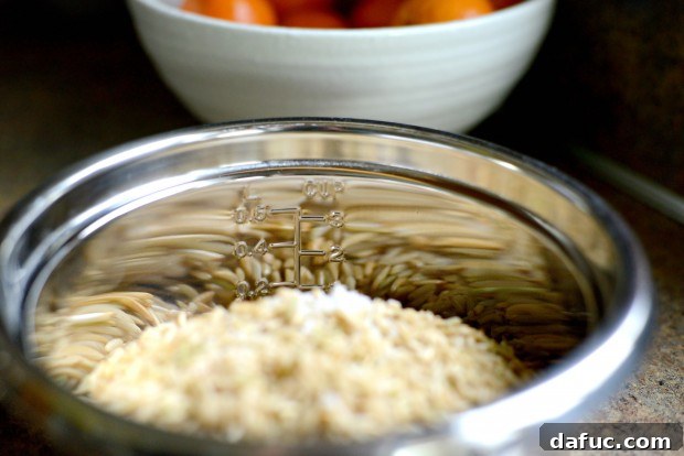 Fragrant Almond Basmati Pilaf 11 Adding water to basmati rice in a rice cooker