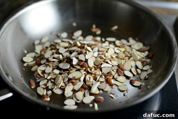 Fragrant Almond Basmati Pilaf 13 Sliced almonds in the skillet for toasting