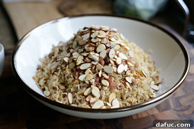 Fragrant Almond Basmati Pilaf 16 Adding toasted almonds to basmati rice