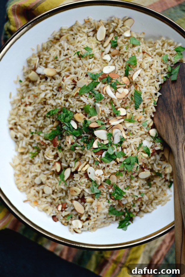 Fragrant Almond Basmati Pilaf 21 Close-up of Garlicky Toasted Almond Basmati Rice in a bowl