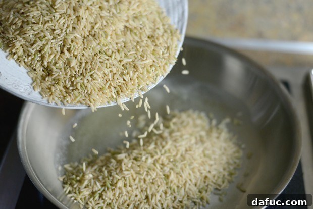 Fragrant Almond Basmati Pilaf 6 Basmati rice added to melted butter in a skillet