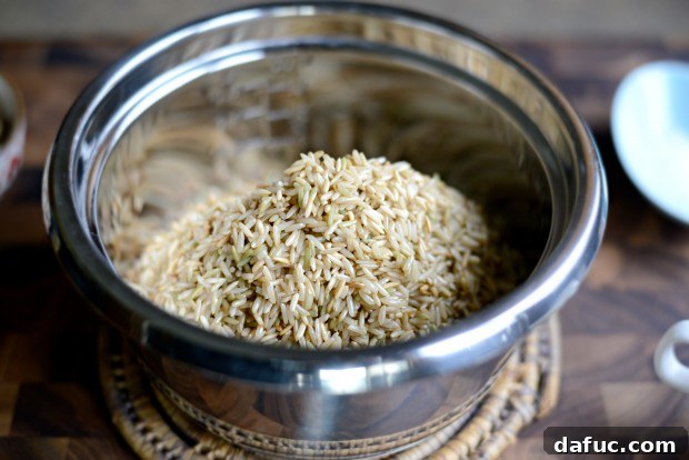 Fragrant Almond Basmati Pilaf 9 Toasted basmati rice transferred to a rice cooker bowl