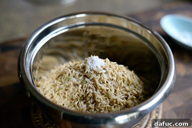 Fragrant Almond Basmati Pilaf 10 Seasoning basmati rice with kosher salt in the rice cooker