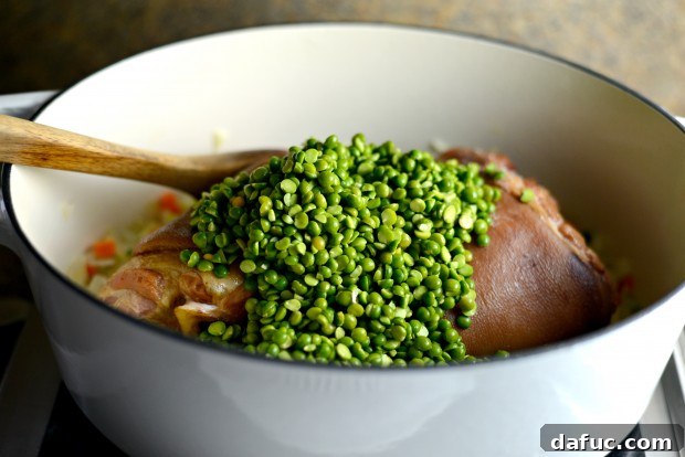 Dried split peas added to the soup pot