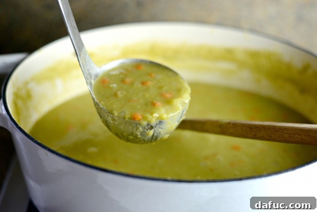Ladle three-quarters of the soup into a blender