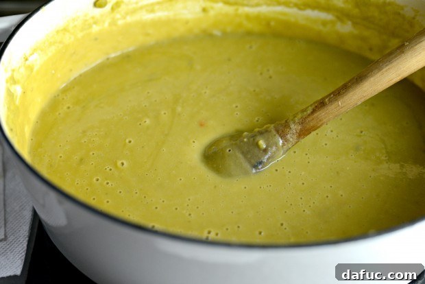 Pureed soup returned to the pot with the remaining soup