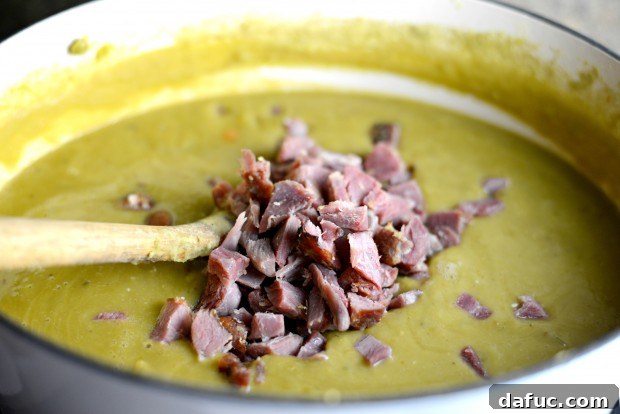 Chopped ham added to the pot of Split Pea Soup