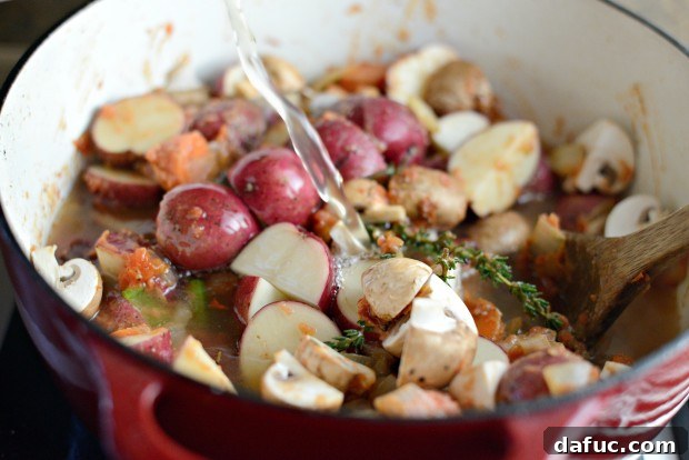 Slow-Simmered Chicken Stew 19 Low-sodium chicken broth poured into the stew